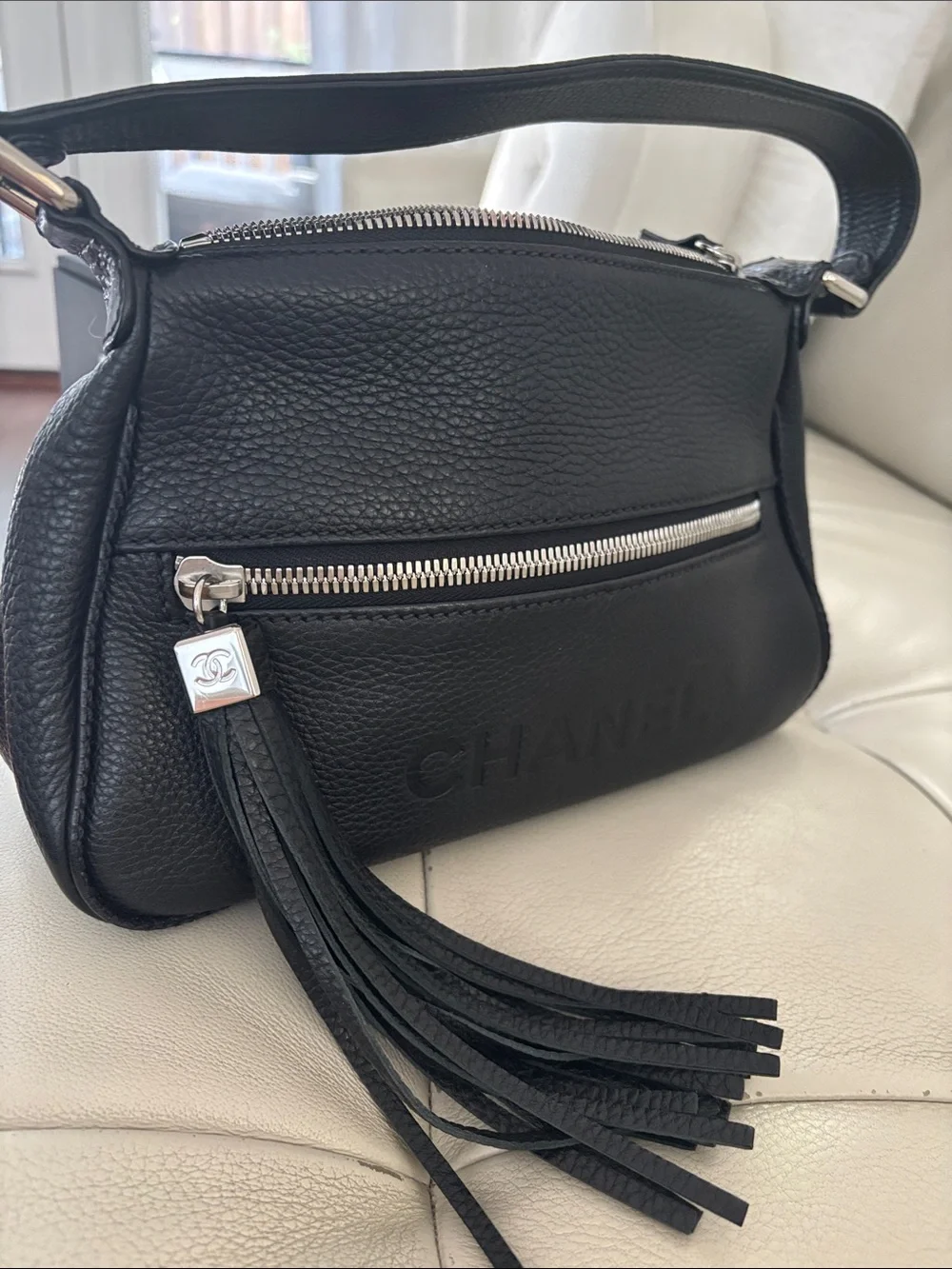 CHANEL Black Pebbled Leather Shoulder Bag with Tassel Zip